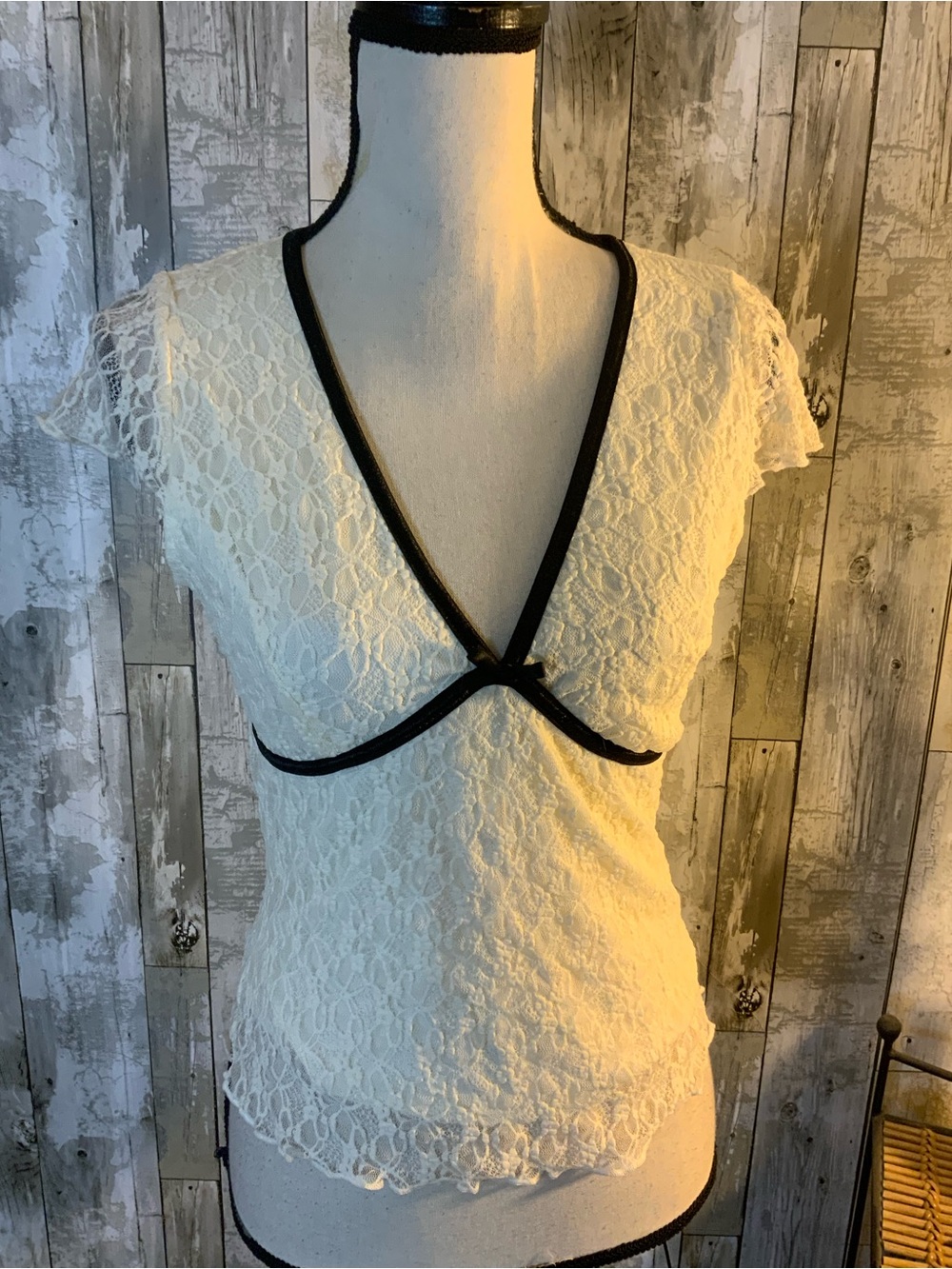 White Lace Cap-Sleeve Blouse with Black Trim